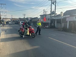 Implementasi Program Kapolri Sat Lantas Polres Batu Bara Patroli Kibas Bendera.